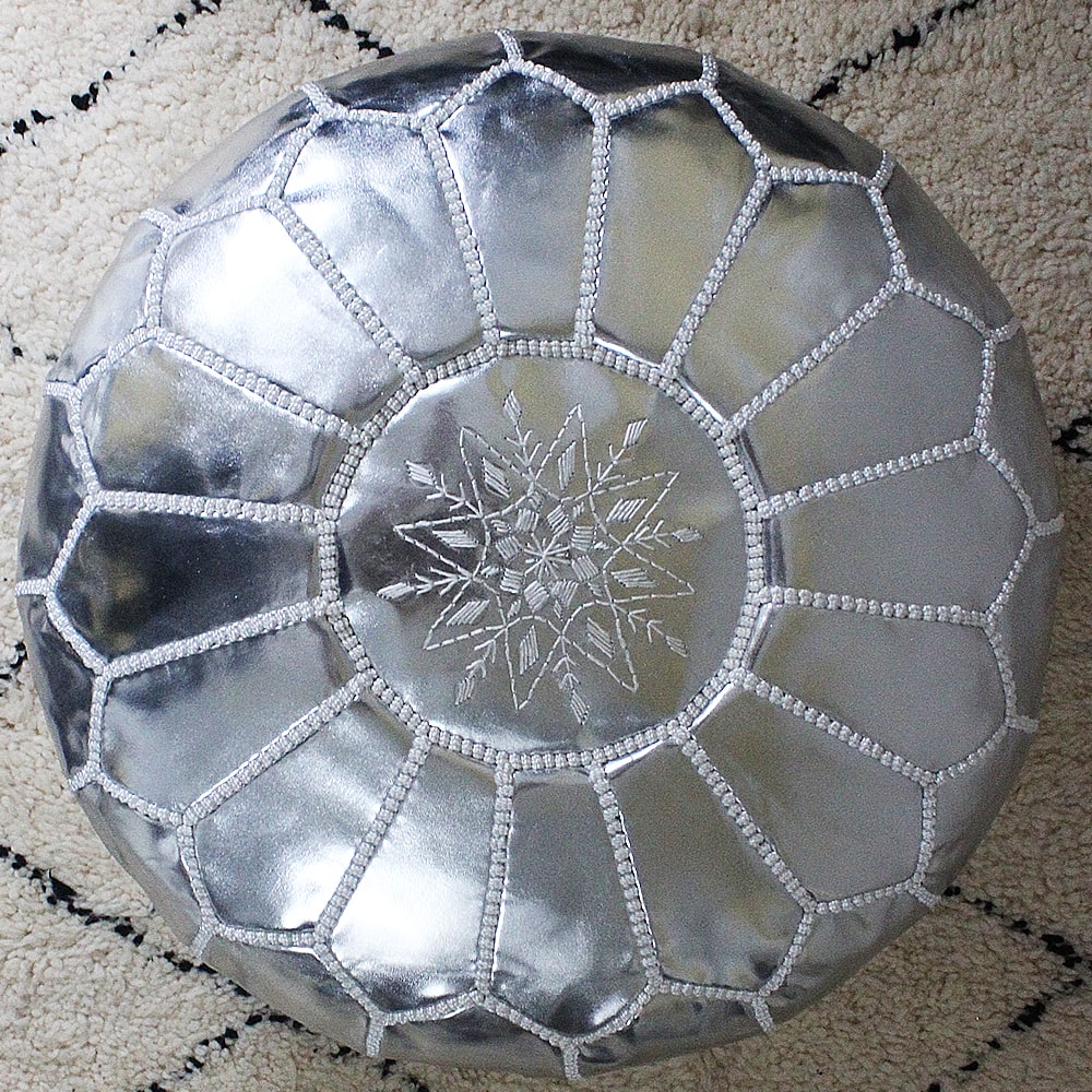 Embroidered silver faux leather pouf